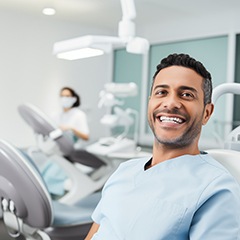 Man smiling while in the dentist’s chair