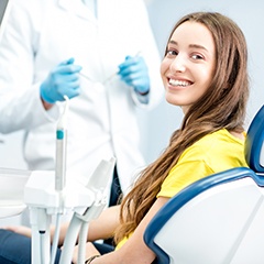 Woman smiling at the dentist’s office